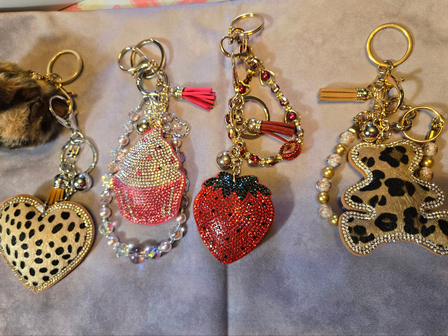 Four decorative keychains 