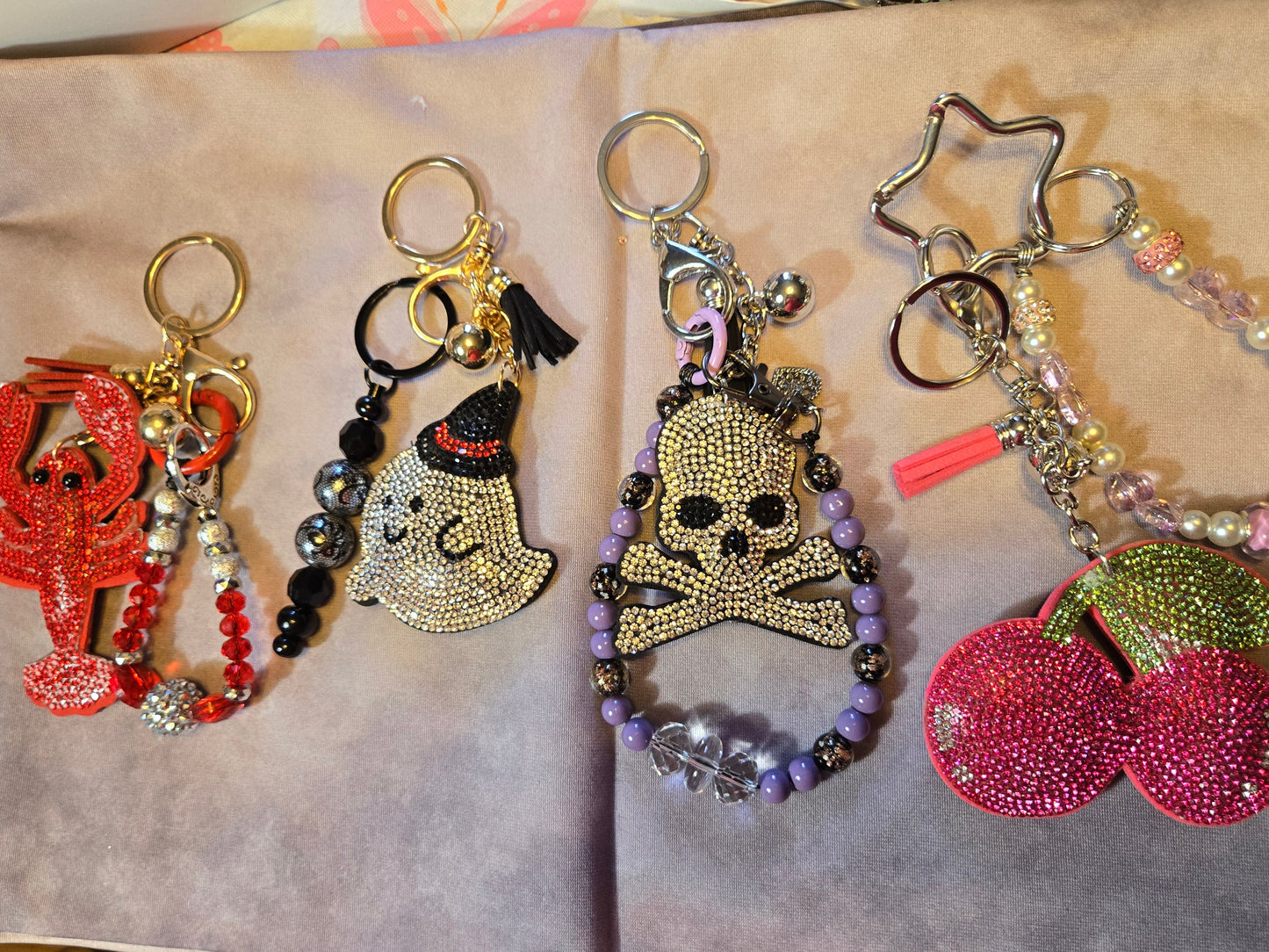 Four decorative keychains 