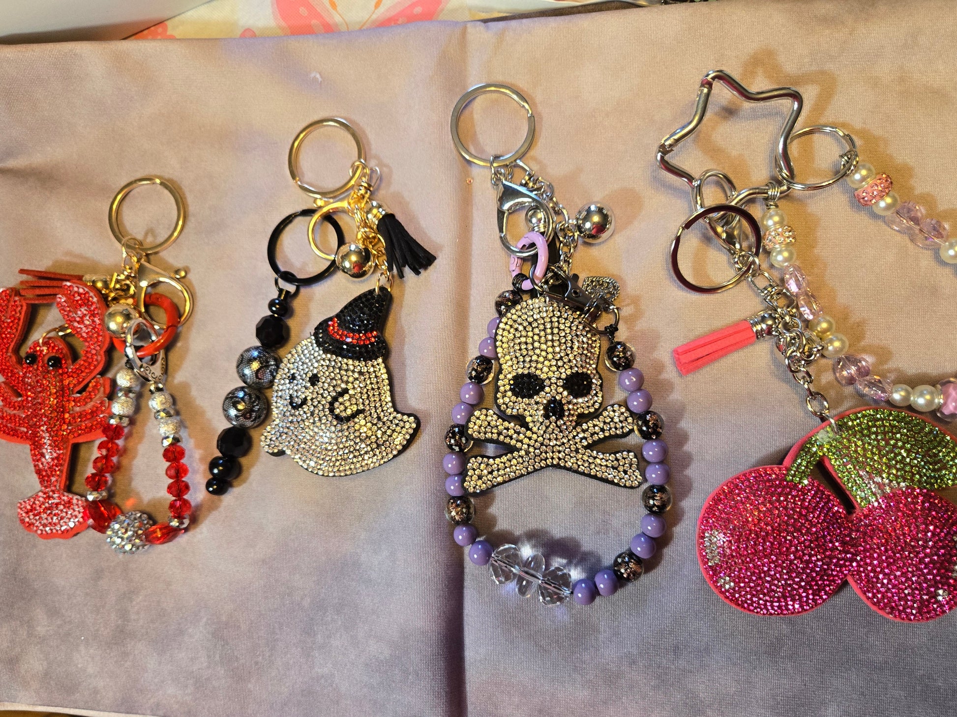 Four decorative keychains 