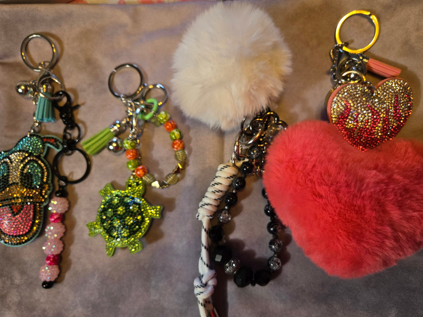 Collection of decorative keychains with various designs 