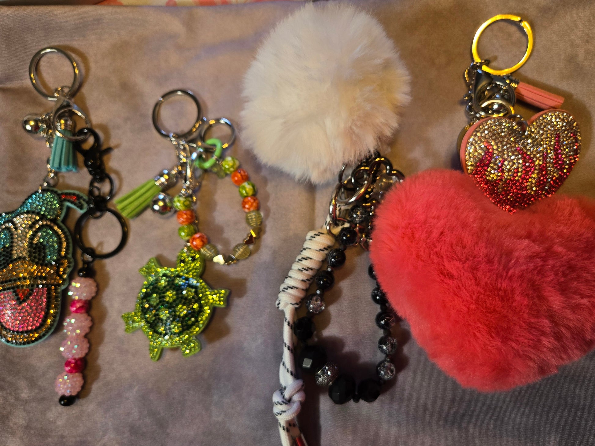 Collection of decorative keychains with various designs 