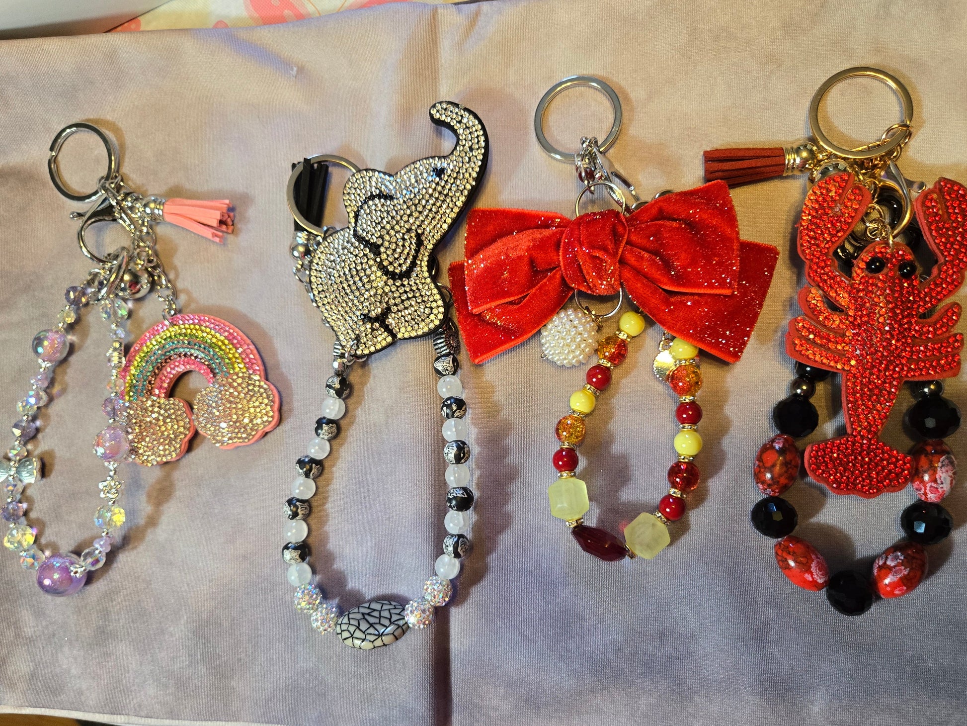 Four decorative keychains 